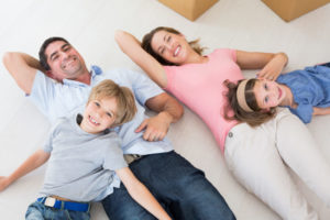 Asthma Happy Family Lying On Floor Shutterstock 185216222